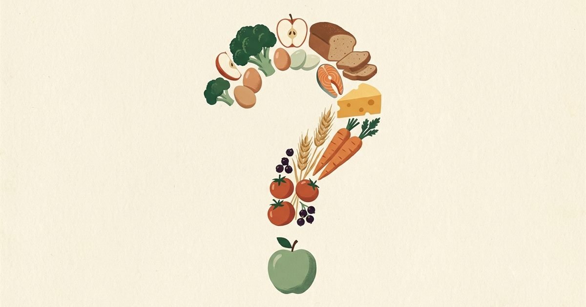 Whole foods — broccoli, apples, bread, eggs, salmon, cheese and carrots — arranged in the shape of a question mark